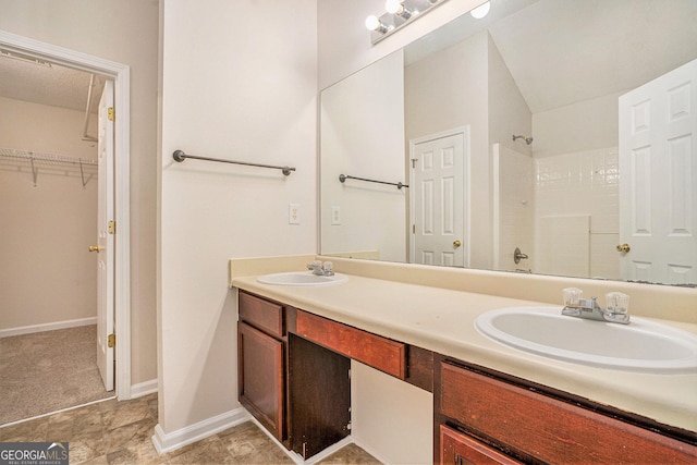 4795 Wilkins Station Dr, Decatur, GA 30035 - full bath with double vanity, a sink, baseboards, and walk in shower