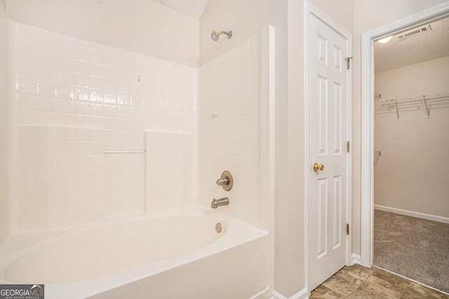 4795 Wilkins Station Dr, Decatur, GA 30035 - bathroom with baseboards, shower / bath combination, a spacious closet, and visible vents