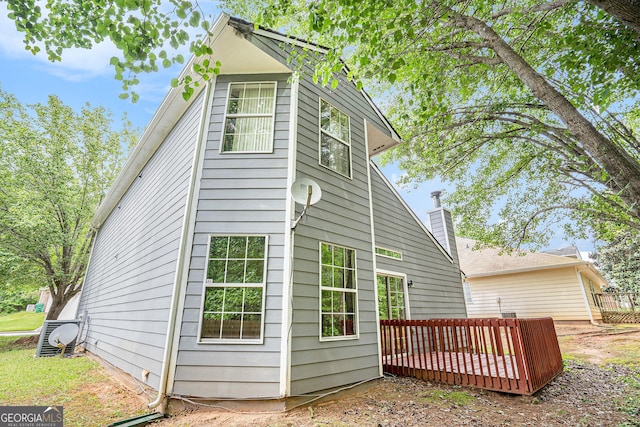 4795 Wilkins Station Dr, Decatur, GA 30035 - view of property exterior with ac unit and a wooden deck