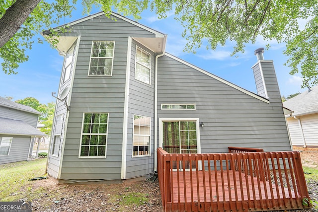 4795 Wilkins Station Dr, Decatur, GA 30035 - back of property with a chimney and a deck