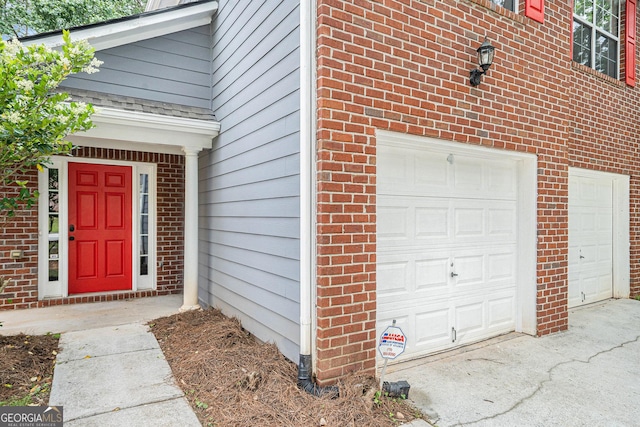 4795 Wilkins Station Dr, Decatur, GA 30035 - entrance to property with a garage and brick siding
