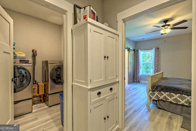 346 Woodland Ln, Hayesville, NC 28904 - laundry room featuring laundry area, ceiling fan, washer and clothes dryer, and light wood-style floors