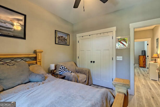 346 Woodland Ln, Hayesville, NC 28904 - bedroom featuring light wood-style floors, a ceiling fan, and a closet