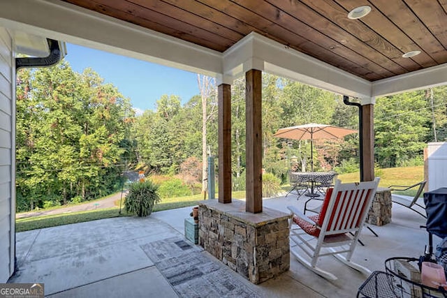346 Woodland Ln, Hayesville, NC 28904 - view of patio / terrace featuring a view of trees and outdoor dining space