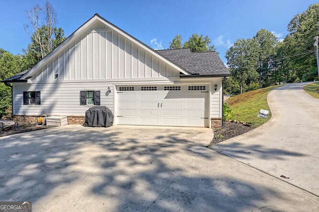 346 Woodland Ln, Hayesville, NC 28904 - view of side of home featuring a garage, board and batten siding, and concrete driveway
