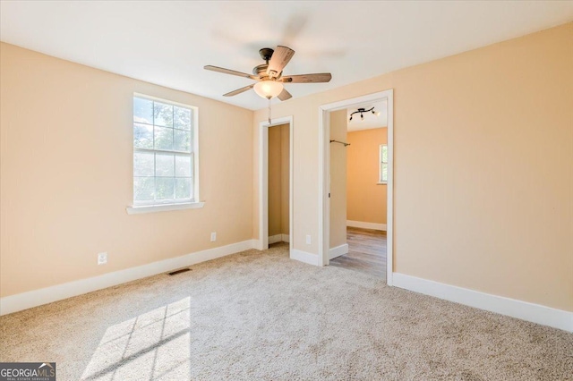 613 Bradley Ave, Lafayette, GA 30728 - unfurnished bedroom featuring carpet floors, baseboards, ceiling fan, and visible vents