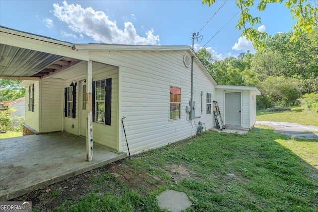 613 Bradley Ave, Lafayette, GA 30728 - view of home's exterior featuring a patio and a yard