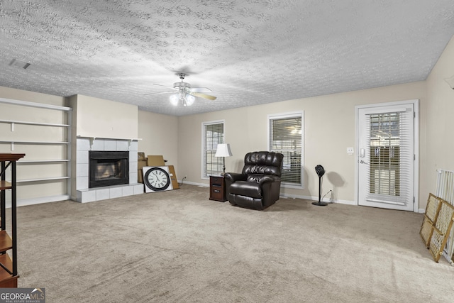 142 Old Hampton Way, Hampton, GA 30228 - sitting room with ceiling fan, baseboards, carpet, and a fireplace