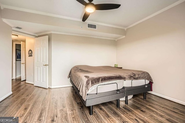 199 14th St Unit 2502, Atlanta, GA 30309 - bedroom featuring crown molding, baseboards, wood finished floors, and visible vents