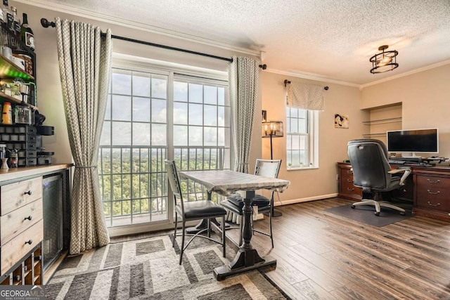 199 14th St Unit 2502, Atlanta, GA 30309 - office area with a textured ceiling, crown molding, baseboards, wine cooler, and hardwood / wood-style floors