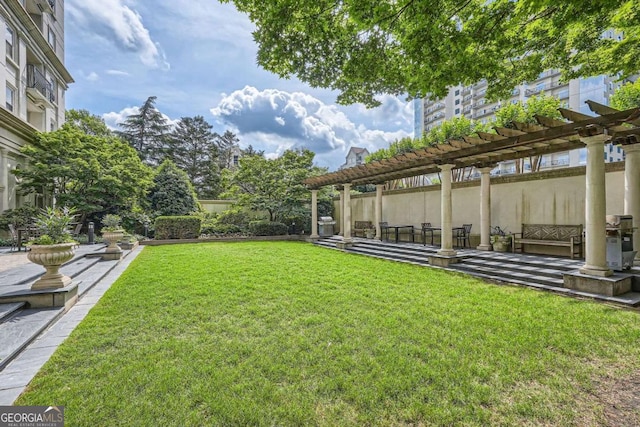 199 14th St Unit 2502, Atlanta, GA 30309 - view of yard featuring a patio and a pergola