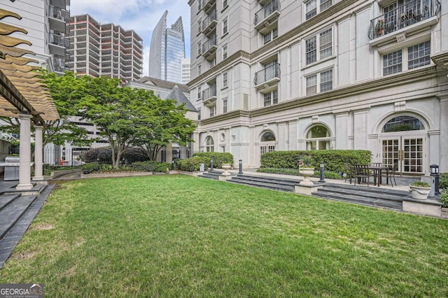 199 14th St Unit 2502, Atlanta, GA 30309 - surrounding community featuring a yard
