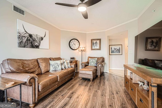 199 14th St Unit 2502, Atlanta, GA 30309 - living area with ceiling fan, visible vents, ornamental molding, and wood finished floors