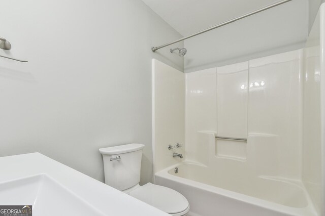 bathroom with  shower combination and toilet