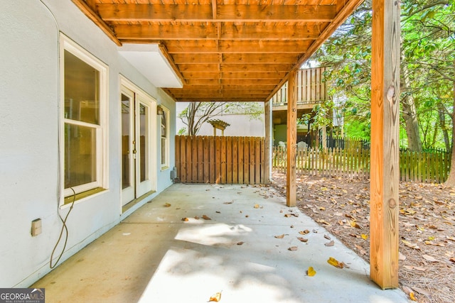 view of patio / terrace featuring fence