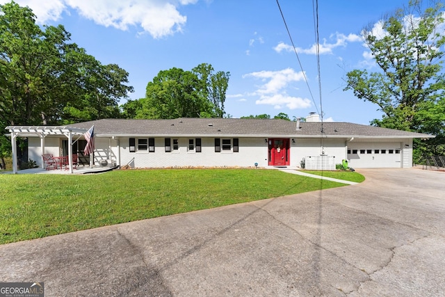 single story home with driveway, a front yard, a garage, brick siding, and a pergola