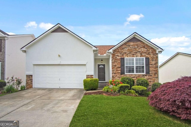 1544 Overview Cir, Lawrenceville, GA 30044 - view of front of house with stone siding, an attached garage, concrete driveway, a front yard, and stucco siding