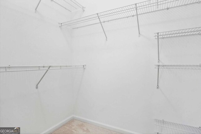 1544 Overview Cir, Lawrenceville, GA 30044 - spacious closet with carpet flooring
