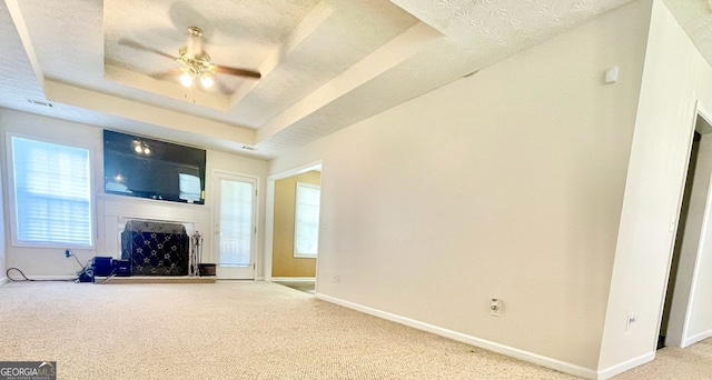127 Mabry Rd, Jackson, GA 30233 - unfurnished living room featuring carpet, a raised ceiling, a fireplace, and baseboards