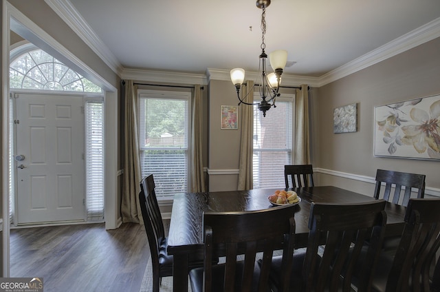 3186 Sail Winds Dr NW, Acworth, GA 30101 - dining area with a chandelier, crown molding, and wood finished floors