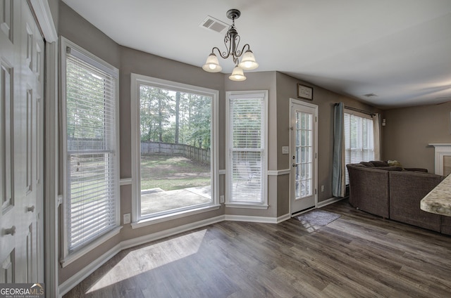 3186 Sail Winds Dr NW, Acworth, GA 30101 - dining area featuring a chandelier, baseboards, visible vents, and dark wood finished floors