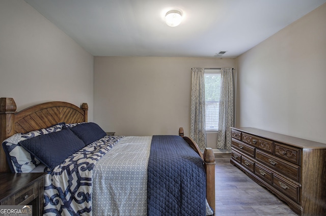 3186 Sail Winds Dr NW, Acworth, GA 30101 - bedroom with visible vents and wood finished floors