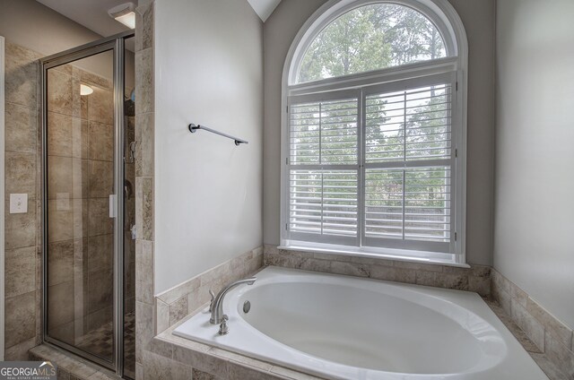 3186 Sail Winds Dr NW, Acworth, GA 30101 - full bathroom with a shower stall and a garden tub