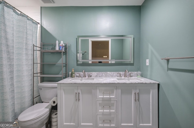 3186 Sail Winds Dr NW, Acworth, GA 30101 - bathroom with double vanity, toilet, and a sink