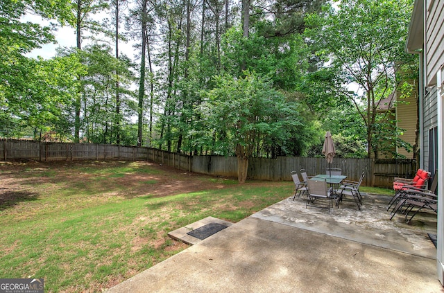 3186 Sail Winds Dr NW, Acworth, GA 30101 - view of yard with a patio, outdoor dining area, and a fenced backyard