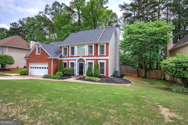 3186 Sail Winds Dr NW, Acworth, GA 30101 - view of front of property with fence, a front yard, a chimney, brick siding, and concrete driveway