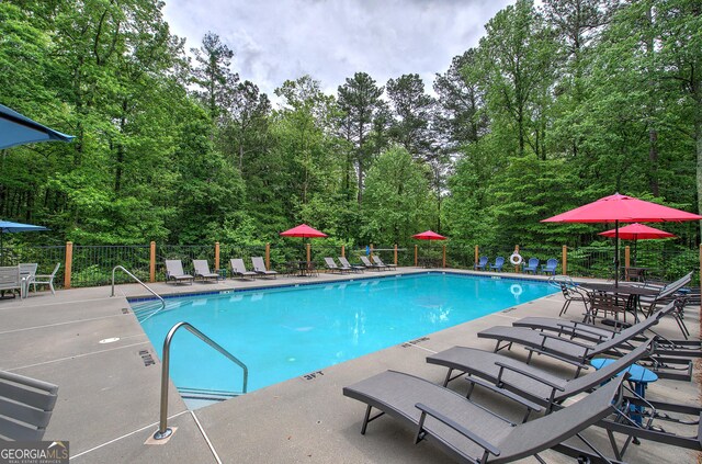 3186 Sail Winds Dr NW, Acworth, GA 30101 - community pool featuring fence and a patio area