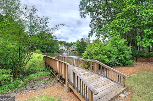 3186 Sail Winds Dr NW, Acworth, GA 30101 - wooden terrace with fence and a water view