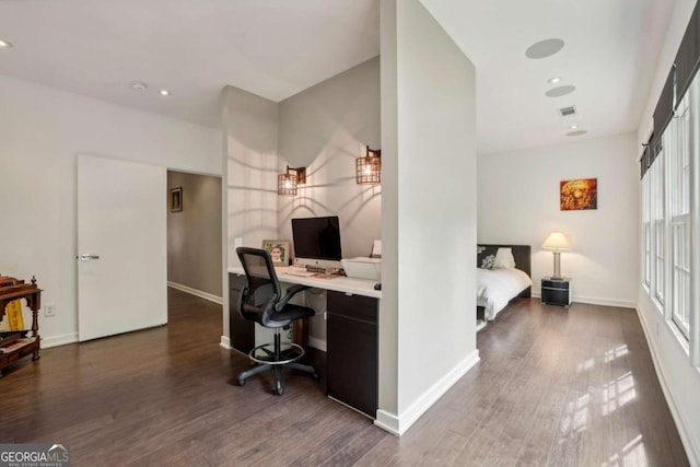 office area featuring baseboards and dark wood-style floors