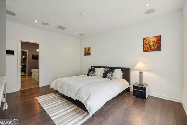bedroom featuring visible vents, recessed lighting, baseboards, and wood finished floors
