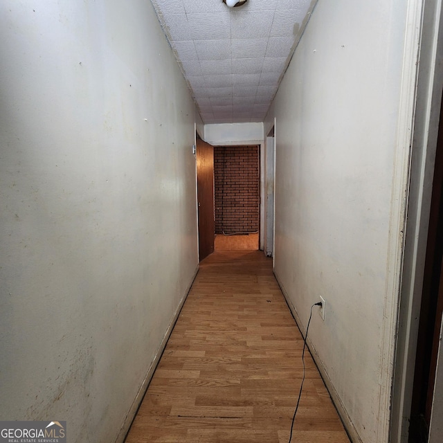 hall with light wood-style flooring