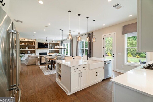 3525 Brynhurst Dr, Cumming, GA 30028 - kitchen featuring recessed lighting, stainless steel appliances, visible vents, and a sink