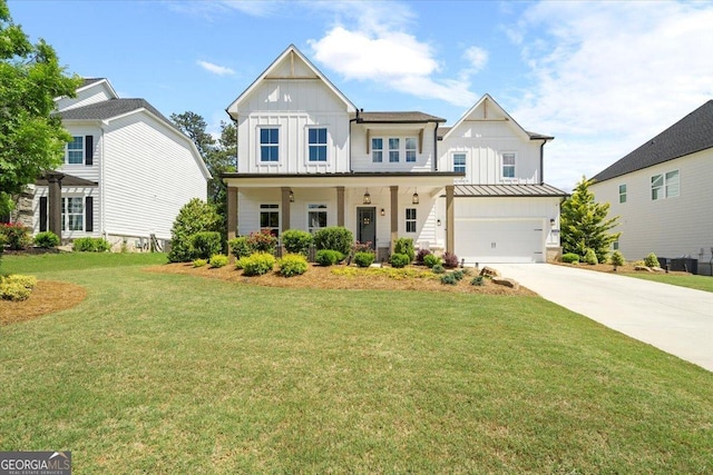 3525 Brynhurst Dr, Cumming, GA 30028 - modern farmhouse style home featuring an attached garage, a front lawn, board and batten siding, concrete driveway, and a standing seam roof