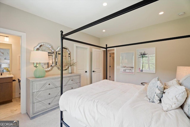 3525 Brynhurst Dr, Cumming, GA 30028 - bedroom with light colored carpet, connected bathroom, and recessed lighting