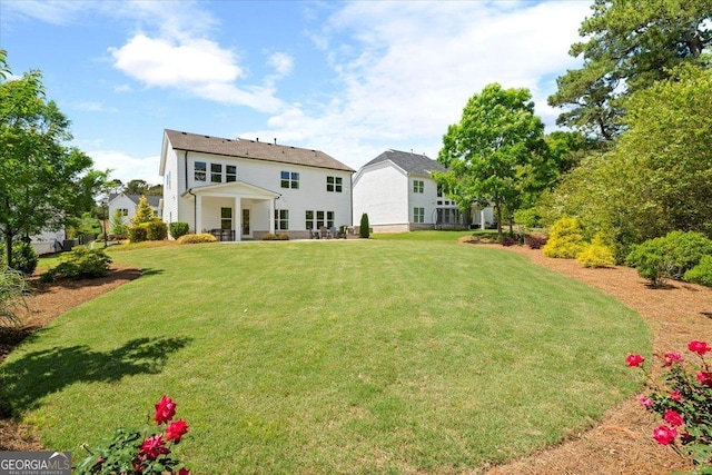 3525 Brynhurst Dr, Cumming, GA 30028 - rear view of property with a lawn and a patio