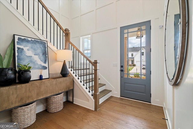 3525 Brynhurst Dr, Cumming, GA 30028 - foyer entrance featuring baseboards, stairs, and wood finished floors