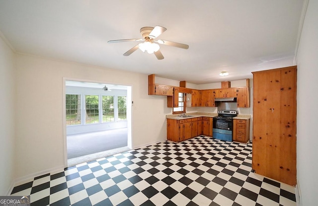 120 Hunt Rd, Athens, GA 30606 - kitchen with a ceiling fan, electric range, brown cabinets, light countertops, and light floors