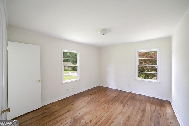 120 Hunt Rd, Athens, GA 30606 - spare room featuring baseboards, ornamental molding, and wood finished floors