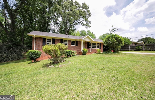 120 Hunt Rd, Athens, GA 30606 - ranch-style home featuring brick siding, fence, and a front yard