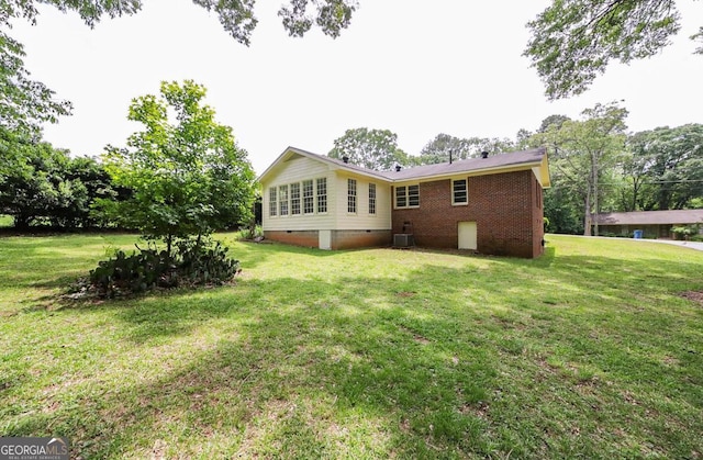 120 Hunt Rd, Athens, GA 30606 - rear view of property featuring a lawn, central air condition unit, and crawl space