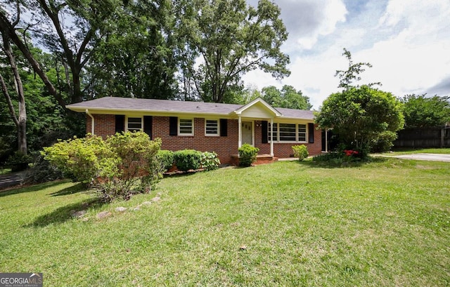 120 Hunt Rd, Athens, GA 30606 - ranch-style house featuring covered porch, brick siding, fence, and a front lawn