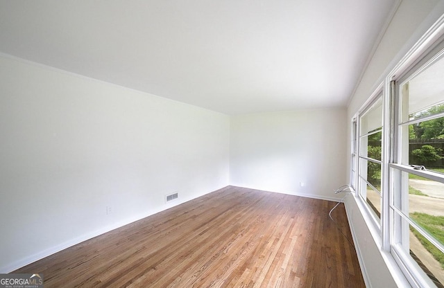 120 Hunt Rd, Athens, GA 30606 - unfurnished room featuring baseboards, wood finished floors, and visible vents