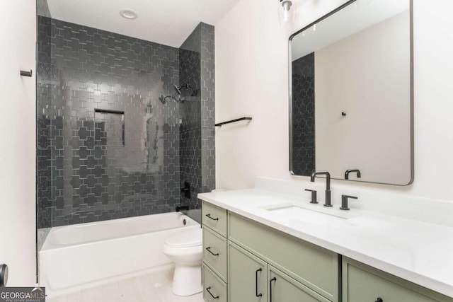 full bath with vanity, washtub / shower combination, and toilet