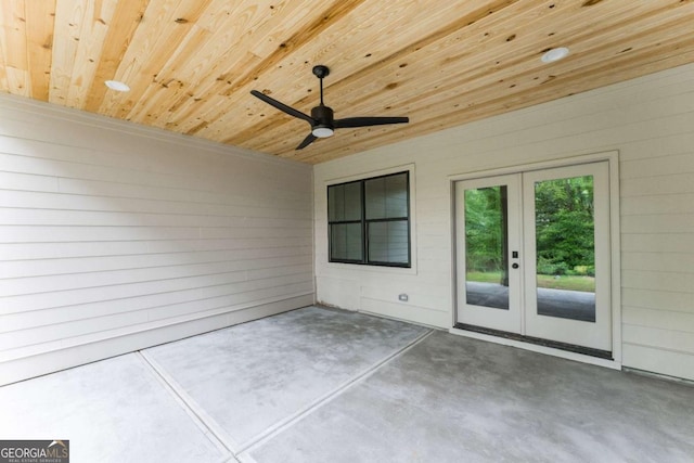 view of patio with ceiling fan and french doors