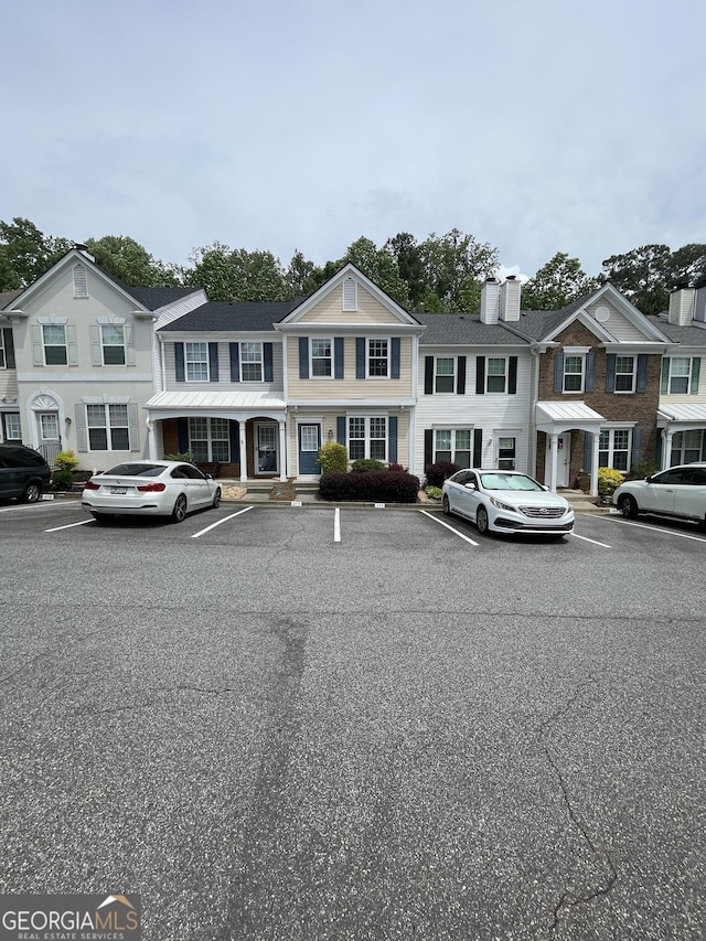 211 Buckland Dr, Alpharetta, GA 30022 - view of building exterior with uncovered parking