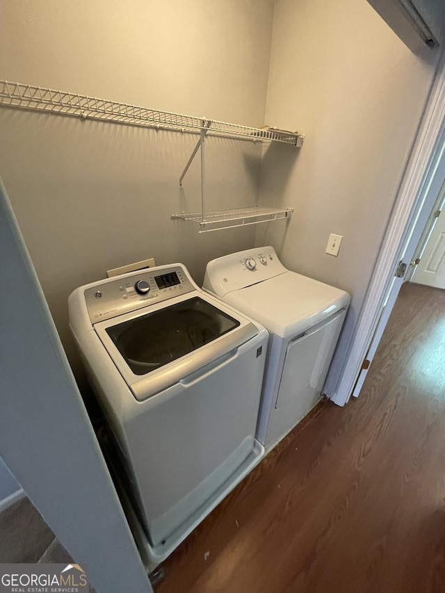 211 Buckland Dr, Alpharetta, GA 30022 - washroom with washer and clothes dryer, dark wood-style flooring, and baseboards